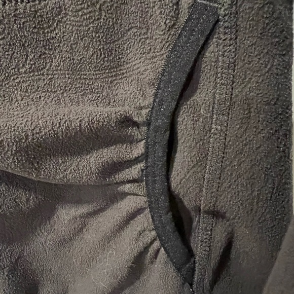 North face Small, embossed pattern, black fleece, front pockets with hood. - Picture 5 of 15